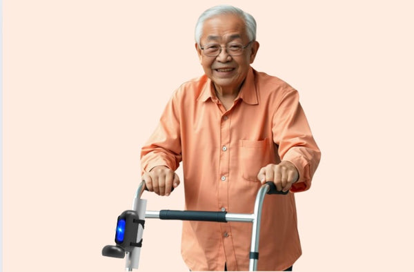 Smiling older man with Glow Guide attached to a walker.  Glow Guide is facing downward and shows blue finder- glow.